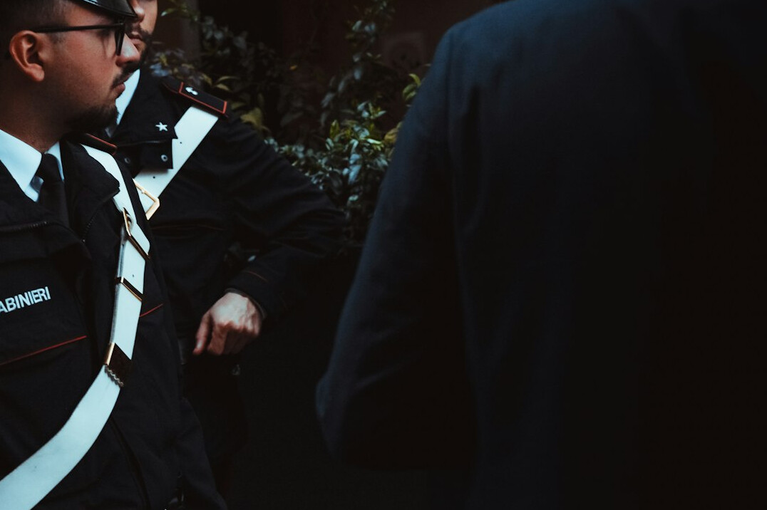 detective confronting shoplifter
