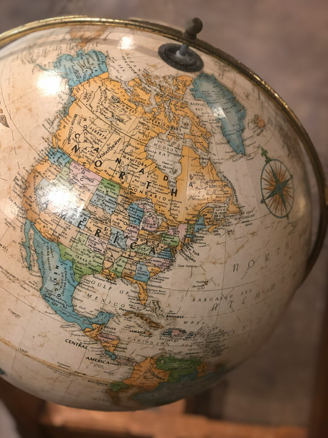 Vintage world map and globe in a study