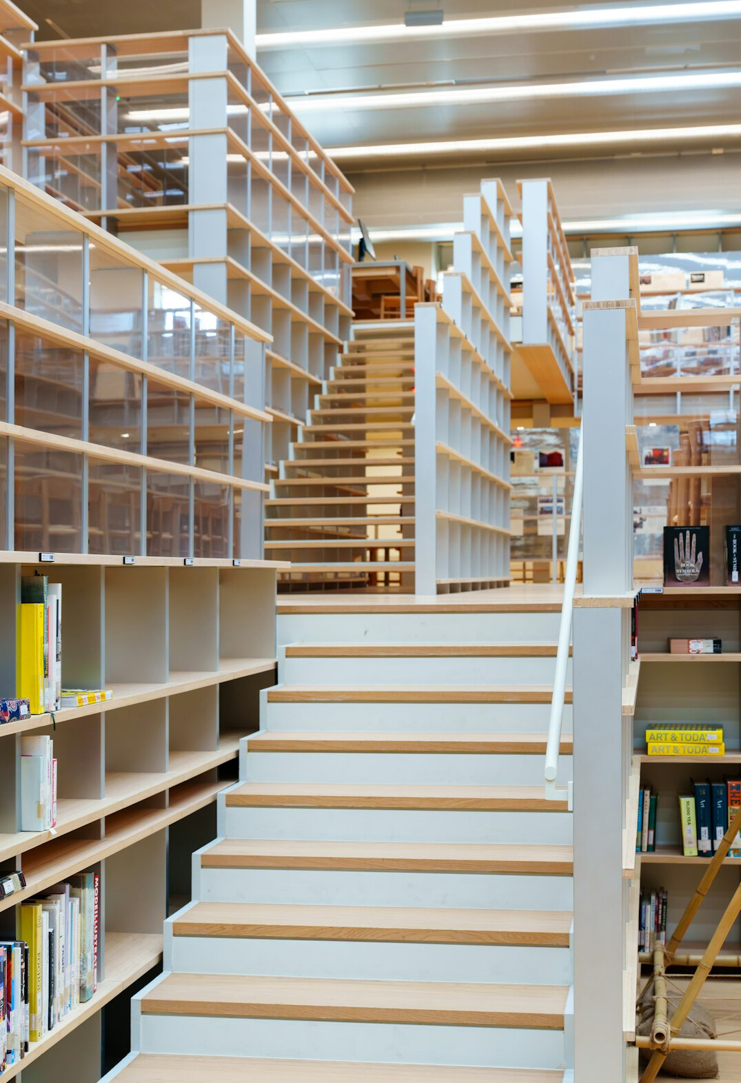 Rows of books on shelves in a reading room