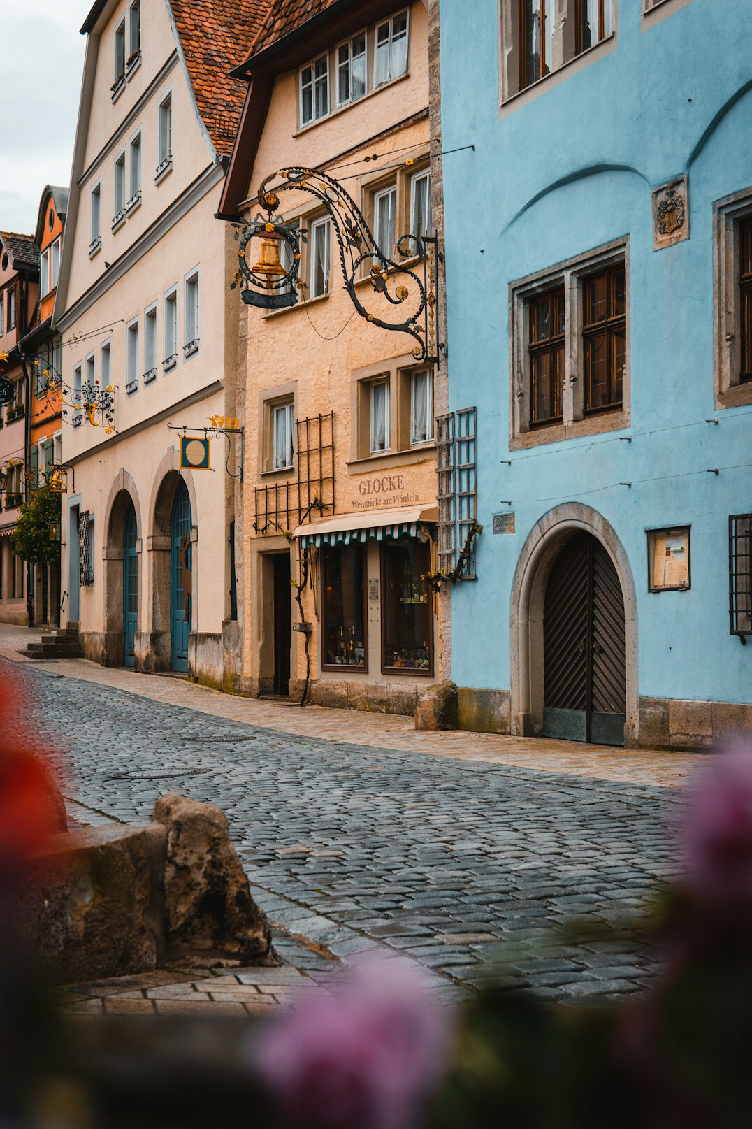 Historic European old town street with colourful townhouses